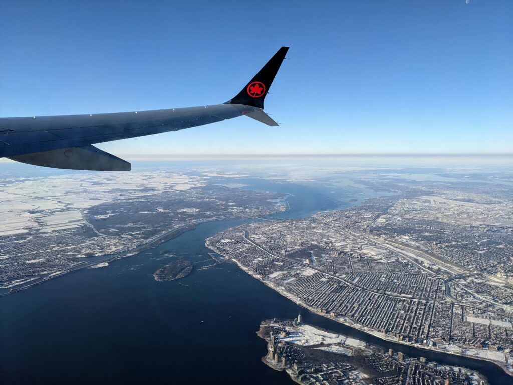 Leaving Snowy Montreal, QC Toward Cloudy Guadeloupe